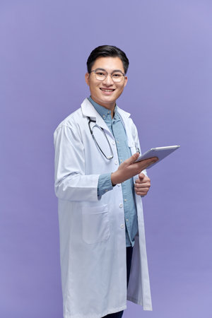 young doctor male holding notebookの写真素材