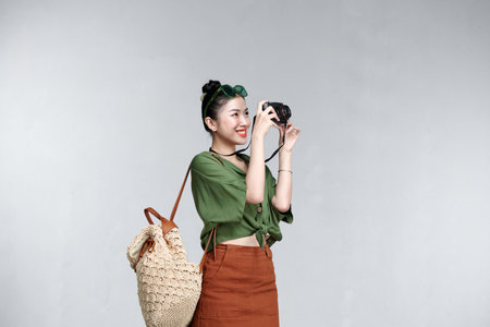 beautiful happiness young asian girl in casual dress traveling aloneの写真素材
