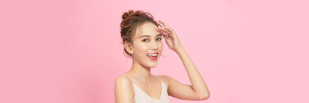 Portrait of young Asian woman with beautiful skin and smileの写真素材