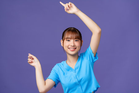 Asian young beautiful woman with hand gesture, show the expression of interesting,の写真素材