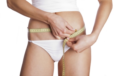female measuring bellyの写真素材