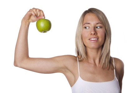 female holds appleの写真素材