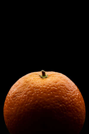 Macro photography of an orange on a black backgroundの写真素材