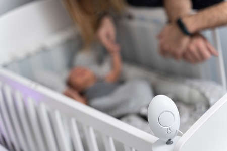 built-in baby video camera above the crib to monitorの写真素材