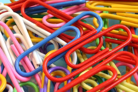 close up on colored paper clips