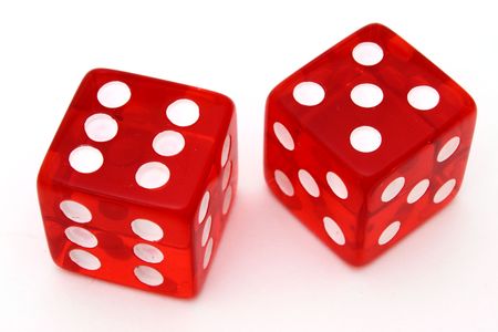 pair of red dice on a white surface pair of red dice on a white surface