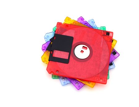 pile of colorful floppy disks over a white surfaceの写真素材