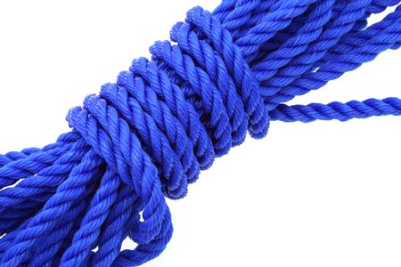 detail of a neatly tied blue rope isolated on white