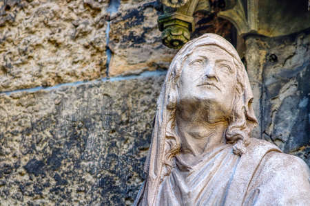 Weathered sandstone sculpture, Apostle portal, St. Thomas Church in Leipzigの写真素材