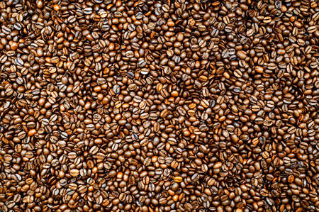 Roasted espresso or coffee beans background. Colorful table top view.の写真素材