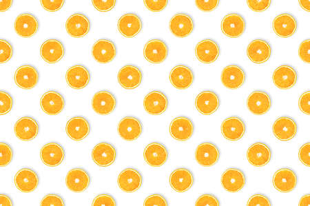 Round, fruity, juicy, tasty: healthy diet concept. Fruit with important nutrients. Pattern of freshly cut orange slices against white background. Vitamin C background, table top view, flat lay.の写真素材