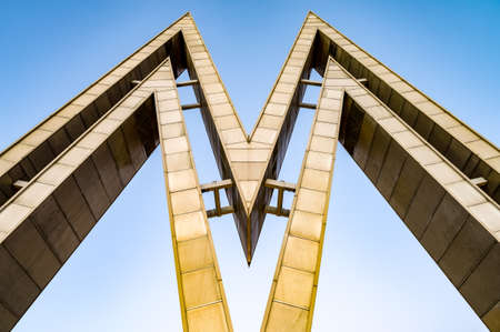 Logo of the Leipzig samples fair (German: Leipziger Mustermesse, designed by Erich Gruner in 1917) as an oversized entrance gate to the old trade fair ground.のeditorial素材