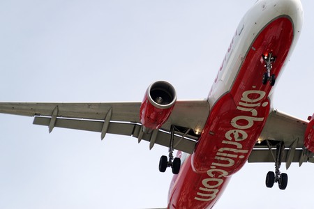 20th of June 2017 Berlin, Germany: The underside of a modern airplane and its landing gear fron the airline Airberlin. Landing at the airport Berlin-Tegelのeditorial素材