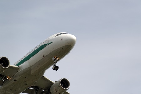 20th of June 2017 Berlin, Germany: The underside of a modern airplane and its landing gear fron the airline Alitalia. Landing at the airport Berlin-Tegelのeditorial素材
