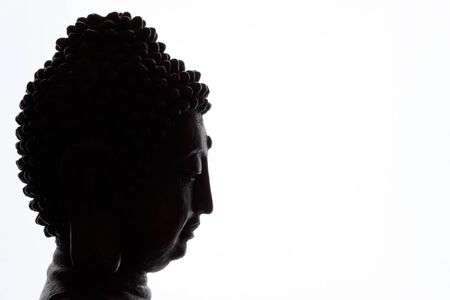 Silhouette of buddha statue with copy spaceの写真素材