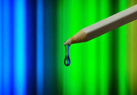 Pencil with water drop and reflectionの写真素材