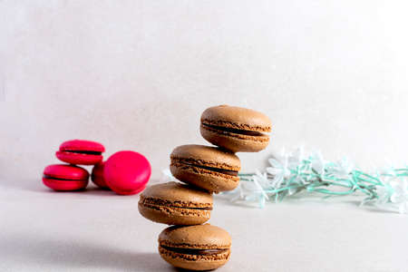 Colorful french pastries called macarons on light backgroundの写真素材