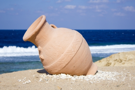 Pitcher on the beach by the seaの写真素材