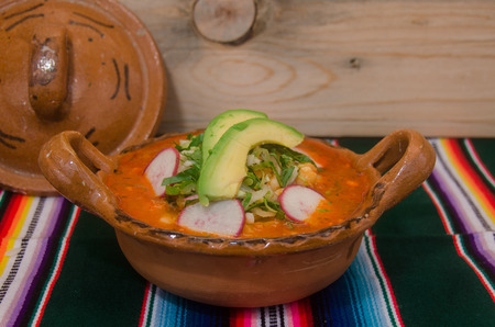 Typical mexican antojito served in a clay dishの写真素材