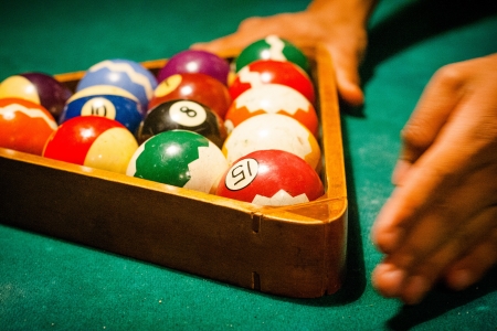 Close up of billiard table with balls in entertainment clubの写真素材