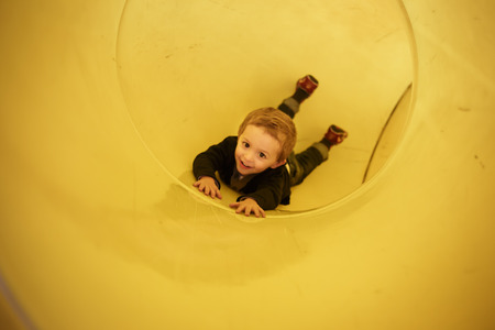 happy little boy on the playground.の写真素材