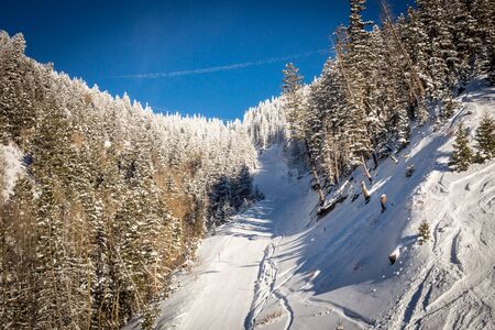 View at the ski slopes piste in the mountains of Angel Fire, New Mexico.の写真素材