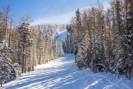 View at the ski slopes piste in the mountains of Angel Fire, New Mexico.の写真素材