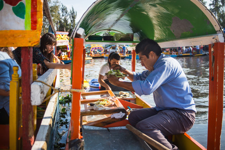 Mexico City, Mexico, August.22. 2015: Colourful Mexican gondolas at Xochimilco's Floating Gardens in Mexico City.のeditorial素材