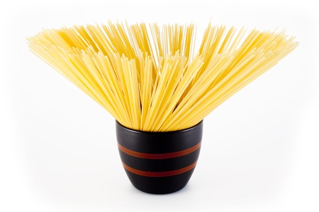 spaghetti in black bowlの写真素材