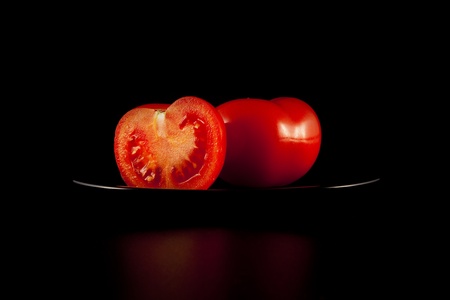 whole tomatoes, and halfの写真素材