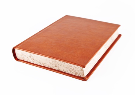 Great Book with orange leather binding on a white background.の写真素材