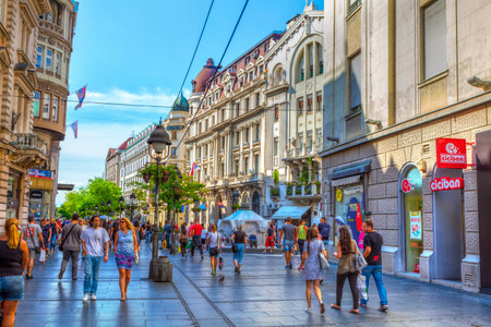 SERBIA, BELGRADE - JULY 26: Knez Mihajlova Street on July 26, 2017 in Belgrade. Buildings of the museum and the Spanish cultural center, old fountains and a lot of people on the street, HDR Image.のeditorial素材
