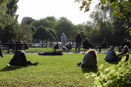 St Stephens Green park people relaxing enjoing weather Dublin Irelandの写真素材