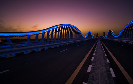 Amazing night dubai VIP bridge with beautiful sunset. Private road to Meydan race course, Dubai,...