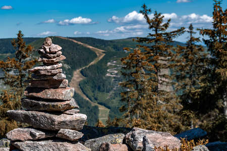 Group of flat stones stacked with off season skiing in Sudetes mountains.の写真素材