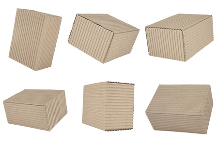 six cuboid cardboard boxes on white backgroundの写真素材