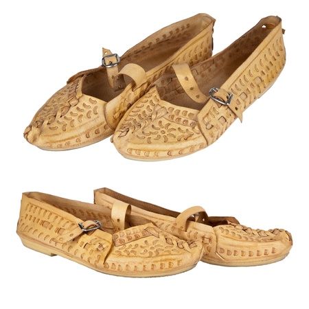 handmade shoes made of leather decorated with the traditional way a very well known in the area of Zakopane in Poland. These shoes are called in original ï¿½kierpceï¿½.の写真素材