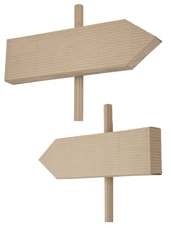 two signposts made of corrugated cardboard over whiteの写真素材