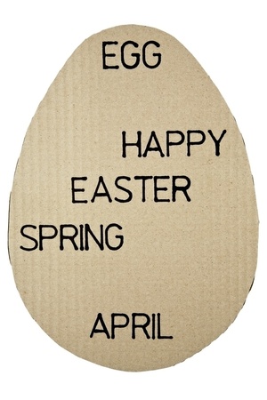 on the corrugated cardboard in the shape of an egg it was written a few words to describe easterの写真素材