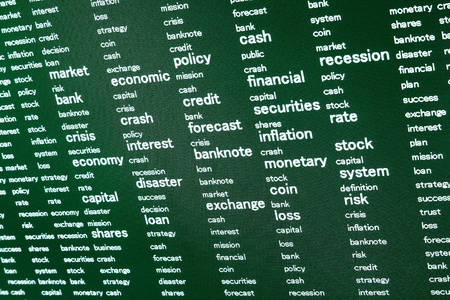 words that describe the problems related to finance are displayed on a computer screenの写真素材