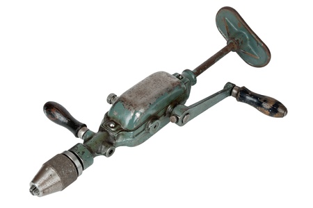 vintage hand drill isolated on a white backgroundの写真素材