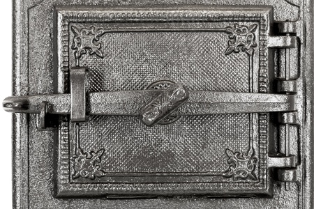 door to the tile stove made of cast ironの写真素材