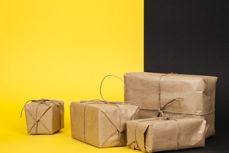 cardboard cartons wrapped with paper and tied with stringの写真素材