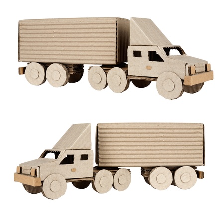 tractor trailer truck made from corrugated board riding in the left and rightの写真素材