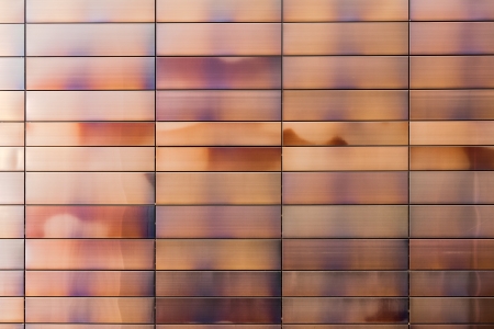 metal panels of modern building facades create interesting industrial backgroundの写真素材