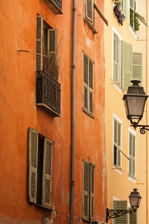 facade of the building in a narrow street of the old town in Nice, Franceの写真素材