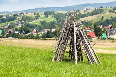 hay harvest equipment in the Tatra mountain in the sunny dayの写真素材