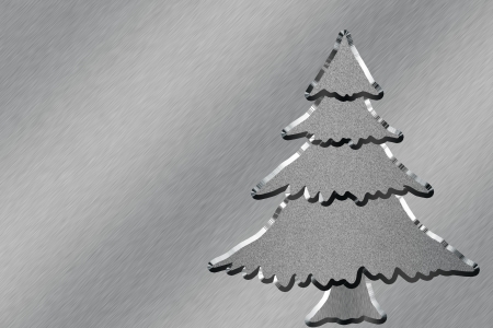 Christmas tree in silver colors as a background for the seasonal postcardの写真素材