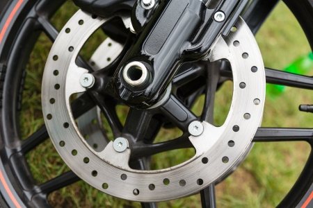 Part of the braking system with a motorcycle front wheelの写真素材