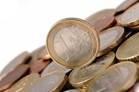 One euro coin shown in the background of otherの写真素材